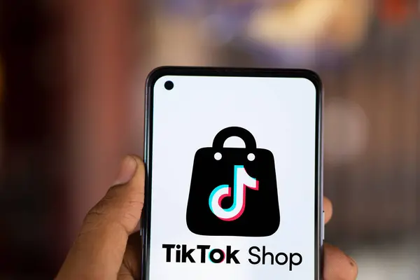 stock image Dhaka, Bangladesh- 10 Sep 2024: Tiktok Shop logo is displayed on smartphone. TikTok Shop is an e-commerce feature of the video hosting service TikTok.