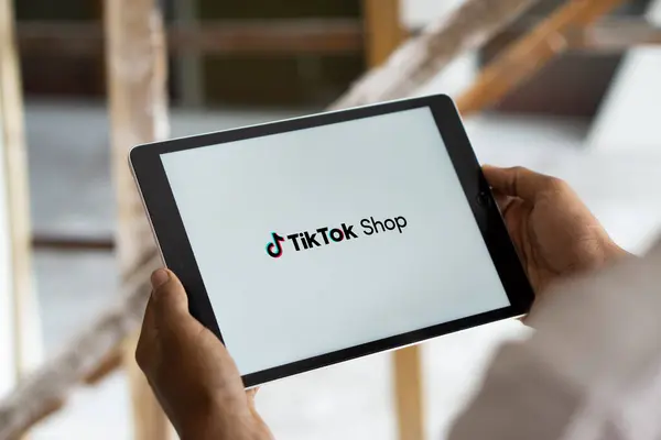 stock image Dhaka, Bangladesh- 10 Sep 2024: Tiktok Shop logo is displayed on iPad. TikTok Shop is an e-commerce feature of the video hosting service TikTok.