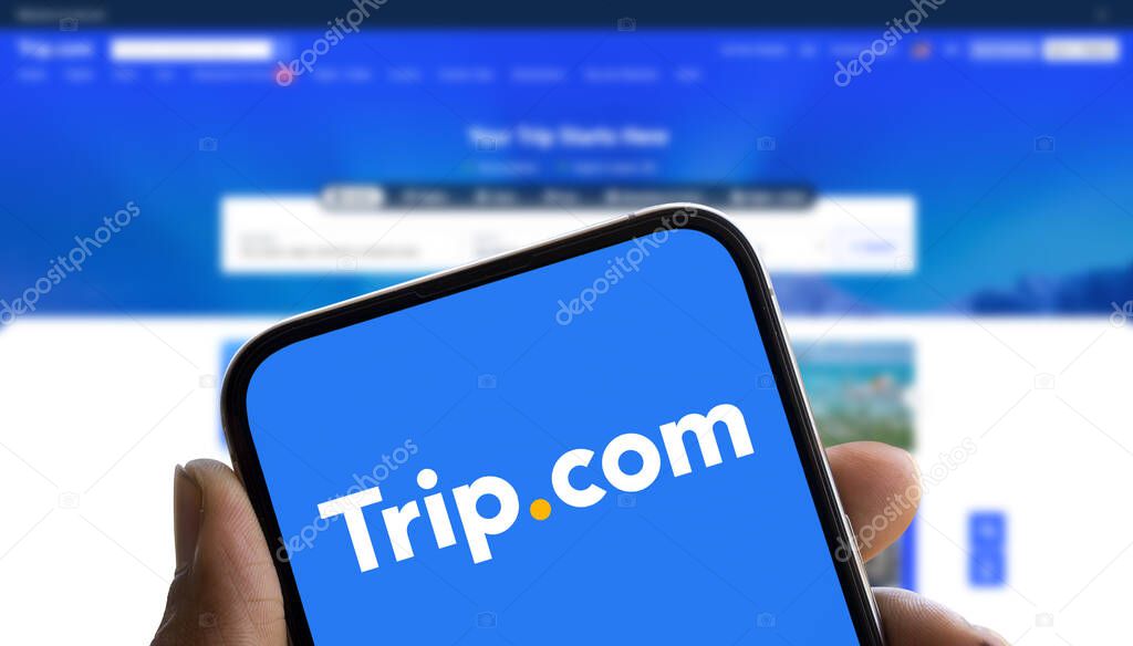 Dhaka, Bangladesh- 10 Sep 2024: Trip.com logo is displayed on smartphone. Trip.com Group Limited is a multinational travel agency.