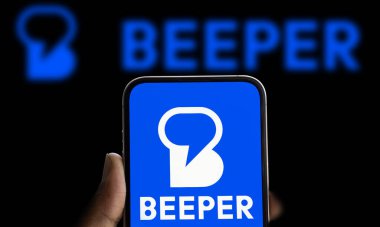 Dhaka, Bangladesh- 16 sep 2024: Beeper logo is displayed on smartphone. Beeper is an instant messenger software. clipart