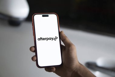 Dhaka, Bangladesh- 26 Sep 2024: Afterpay logo is displayed on smartphone. clipart