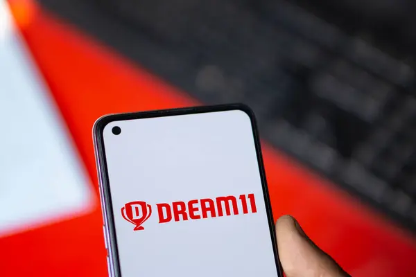 stock image Dhaka, Bangladesh- 26 Sep 2024: Dream11 logo is displayed on smartphone.