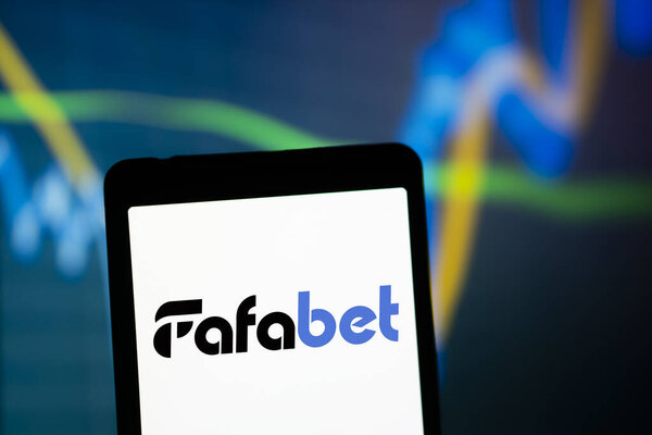 Dhaka, Bangladesh- 26 Sep 2024: Fatabet logo is displayed on smartphone.