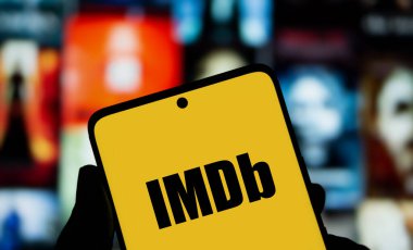 Dhaka, Bangladesh- 01 Oct 2024: IMDb logo is displayed on smartphone. clipart