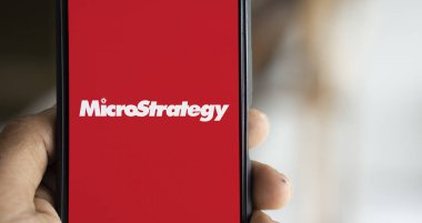 Dhaka, Bangladesh- 24 Oct 2024: MicroStrategy logo is displayed on smartphone. clipart