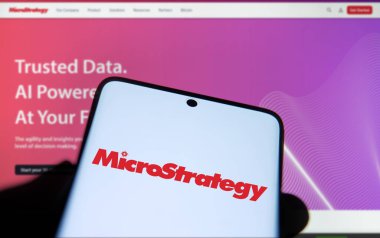 Dhaka, Bangladesh- 24 Oct 2024: MicroStrategy logo is displayed on smartphone. clipart