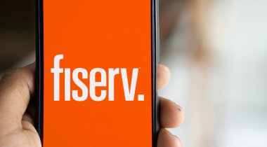 Dhaka, Bangladesh- 31 Oct 2024: Fiserv logo is displayed on smartphone. clipart