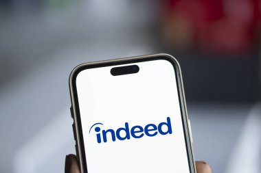 Dhaka, Bangladesh- 08 Nov 2024: Indeed logo is displayed on smartphone. clipart