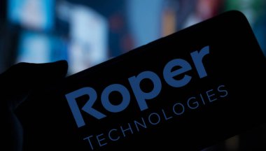 Dhaka, Bangladesh- 10 Nov 2024: Roper Technologies logo is displayed on smartphone. Roper Technologies Inc is an American diversified industrial company. clipart