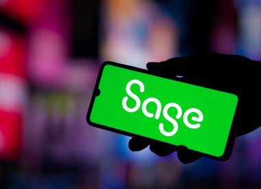 Dhaka, Bangladesh- 10 Nov 2024: Sage Group logo is displayed on smartphone. Sage Group plc is a British software company. clipart