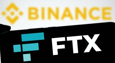 Dhaka, Bangladeş - 16 Kasım 2024: Binance ve FTX logosu akıllı telefonda gösteriliyor.