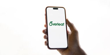 Dhaka, Bangladesh- 26 Nov 2024: Overleaf logo is displayed on smartphone. Overleaf is a cloud-based LaTeX editor for scientific writing and publishing. clipart