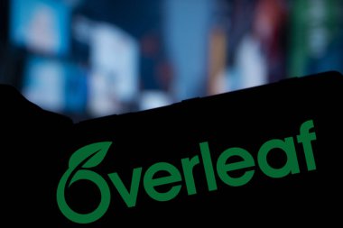 Dhaka, Bangladesh- 26 Nov 2024: Overleaf logo is displayed on smartphone. Overleaf is a cloud-based LaTeX editor for scientific writing and publishing. clipart