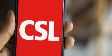 Dhaka, Bangladesh- 28 Nov 2024: CSL logo is displayed on smartphone. CSL Limited is an Australian biotechnology company. clipart