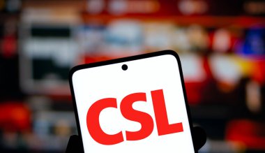 Dhaka, Bangladesh- 28 Nov 2024: CSL logo is displayed on smartphone. CSL Limited is an Australian biotechnology company. clipart