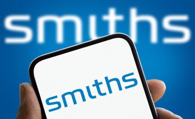 Dhaka, Bangladesh- 5 Dec 2024: Smiths Group logo is displayed on smartphone. Smiths Group plc is a British multinational company. clipart