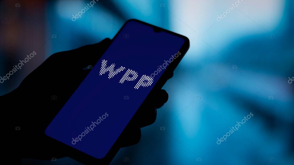 Dhaka, Bangladesh- 5 Dec 2024: WPP logo is displayed on smartphone. WPP plc is a British multinational communications, technology and commerce holding company.