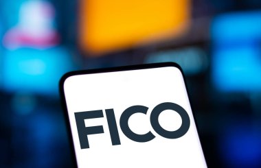 Dhaka, Bangladesh- 21 Dec 2024: FICO logo is displayed on smartphone.  FICO is an American data analytics company. clipart