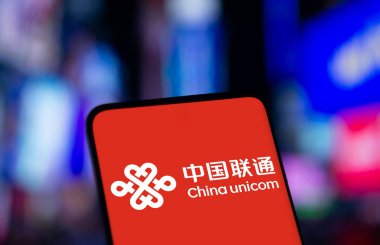 Dhaka, Bangladesh- 23 Dec 2024: china unicom logo is displayed on smartphone. China United Network Communications Group is a Chinese state owned telecommunications operator company. clipart