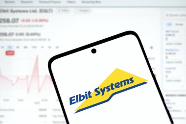 Dhaka, Bangladesh- 2 Jan 2025: Elbit systems logo is displayed on smartphone. Elbit Systems Ltd is an Israel based international military technology company. clipart