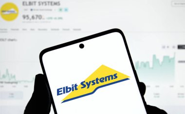 Dhaka, Bangladesh- 2 Jan 2025: Elbit systems logo is displayed on smartphone. Elbit Systems Ltd is an Israel based international military technology company. clipart