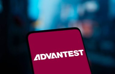 Dhaka, Bangladesh- 15 Dec 2024: Advantest logo is displayed on smartphone. Advantest Corporation is a leading Japanese manufacturer of automated test equipment for the semiconductor industry. clipart