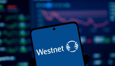 Dhaka, Bangladesh- 17 Dec 2024: Westnet logo is displayed on smartphone. Westnet is a Perth-based Australian telecommunications company. clipart