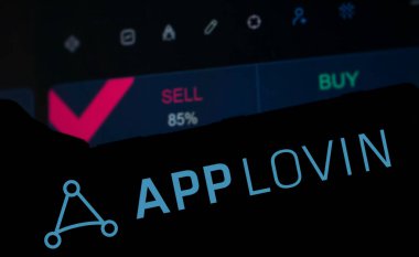 Dhaka, Bangladesh- 19 Dec 2024: App lovin logo is displayed on smartphone. AppLovin Corporation is an American mobile technology company. clipart