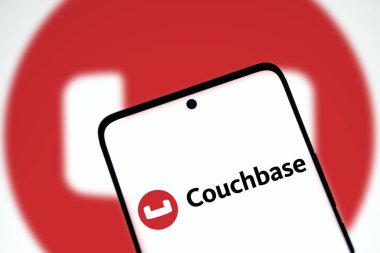 Dhaka, Bangladesh- 16 jan 2025: Couchbase Server logo is displayed on smartphone. clipart