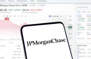 Dhaka, Bangladesh- 25 Dec 2024: JPMorganChase logo is displayed on smartphone. clipart