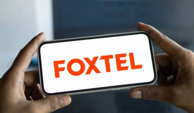 Dhaka, bangladesh- 19 Nov 2024: foxtel logo is displayed on smartphone. Foxtel Group is an Australian pay television company. clipart