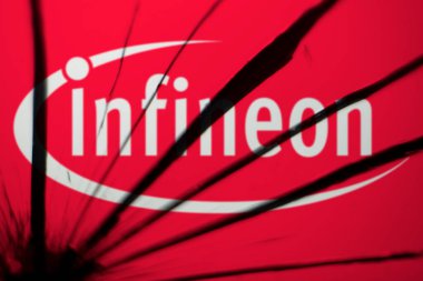 Dhaka, bangladesh- 21 Nov 2024: infineon logo is visible on the broken glass. Infineon Technologies AG is Germany's largest semiconductor manufacturer company. clipart