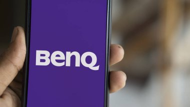 Dhaka, Bangladesh- 20 jan 2025: Benq logo is displyed on smartphone. BenQ Corporation is a Taiwanese multinational company. clipart