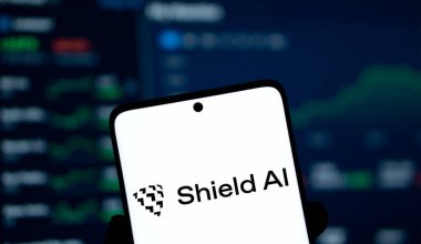 Dhaka, Bangladesh- 11 Jan 2025: Shield ai logo is displayed on smartphone. Shield AI is an American aerospace and arms technology company. clipart