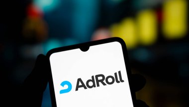 Dhaka, Bangladesh- 22 Jan 2025: adroll logo is displayed on smartphone. AdRoll is a marketing and advertising platform. clipart