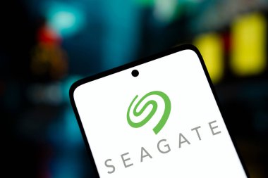 Dhaka, Bangladesh- 19 Jan 2025: seagate logo is displayed on smartphone. Seagate is an American data storage company. clipart