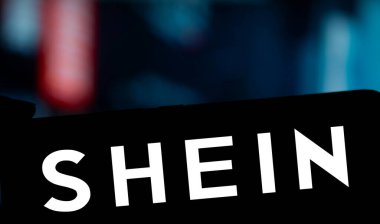 Dhaka, bangladesh- 26 Nov 2024: Shein logo is displayed on smartphone.Shein is a fast fashion retailer company. clipart