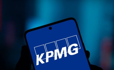 Dhaka, Bangladesh- 6 Jan 2025: kpmg logo is displayed on smartphone. KPMG International Limited is a multinational professional services network company. clipart