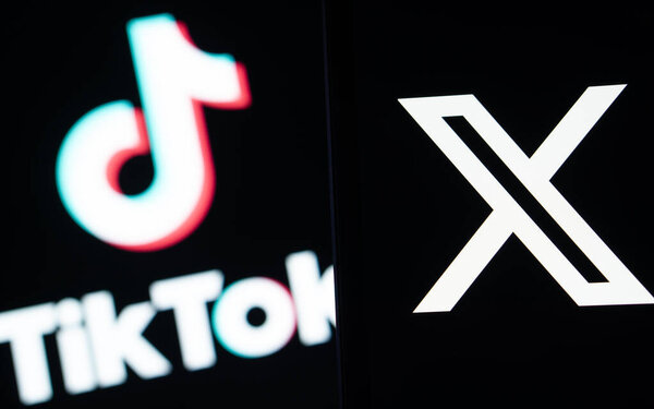 Dhaka, Bangladesh- 07 Feb 2025: Twitter (X) logo is seen on a smartphone and Tiktok logo in the background.