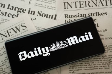 Dhaka, Bangladesh - 16 March 2025: The logo of the UK newspaper Daily mail is displayed on a smartphone screen. clipart