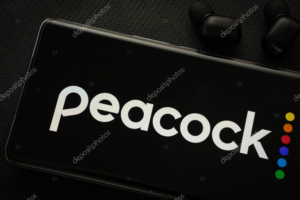 Dhaka, Bangladesh - 17 March 2025: The logo of the peacock is displayed on a smartphone screen.