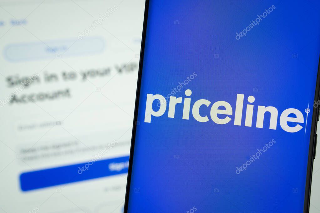 Dhaka, Bangladesh- 17 March 2025: priceline logo is displayed on a smartphone screen, with the priceline login page visible on a computer screen in the background.