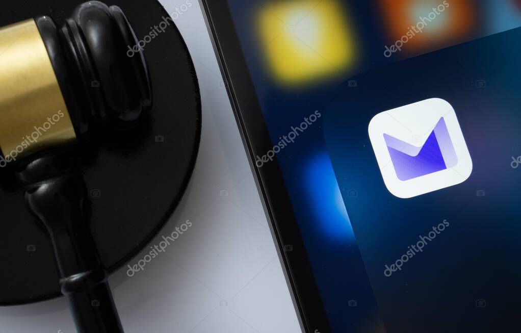 Dhaka, Bangladesh- 17 March 2025: A close up of an iPad screen displaying the proton mail app alongside a judge's gavel.