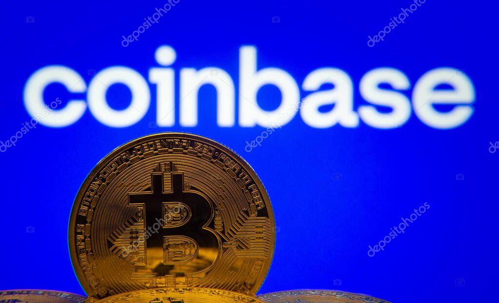 Dhaka, Bangladesh- 16 June 2025: Close-up of Bitcoin coins with the Coinbase logo visible on a screen in the background.