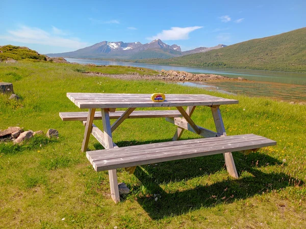 stock image bench near a mountain lake