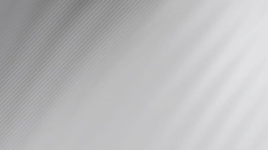 Değişen ışık ve gölge içeren gri soyut video derinlik ve doku yaratır. Pürüzsüz geçişleri olan minimal tasarım, modern arkaplanlar ve grafik tasarım projeleri için mükemmel.