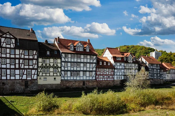 Stock image German town Rotenburg with the Fulda river cutting through the middle is surrounded by a row of colorful half-timbered homes that are built side by side and have a view of the river.