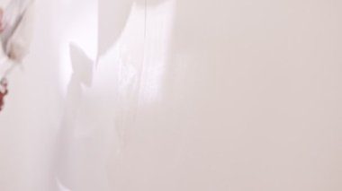 Close up of construction worker applying plaster to a wall