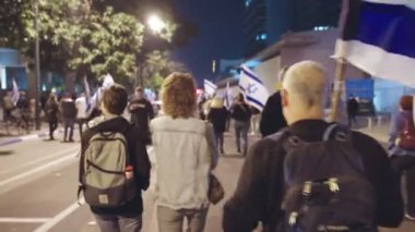 Tel Aviv, ISRAEL - March 4, 2023. Thousands of people marching in the streets in protest of the Israeli judicial reform.