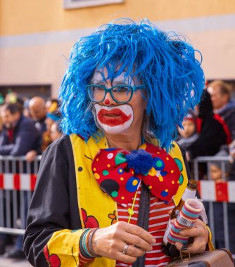 Villach, Austria - 2023 February 19: Carnival in Villach, Fasching, Participants in the annual parade wear colorful and masquerade clothing. Motto: Lei-Lei.